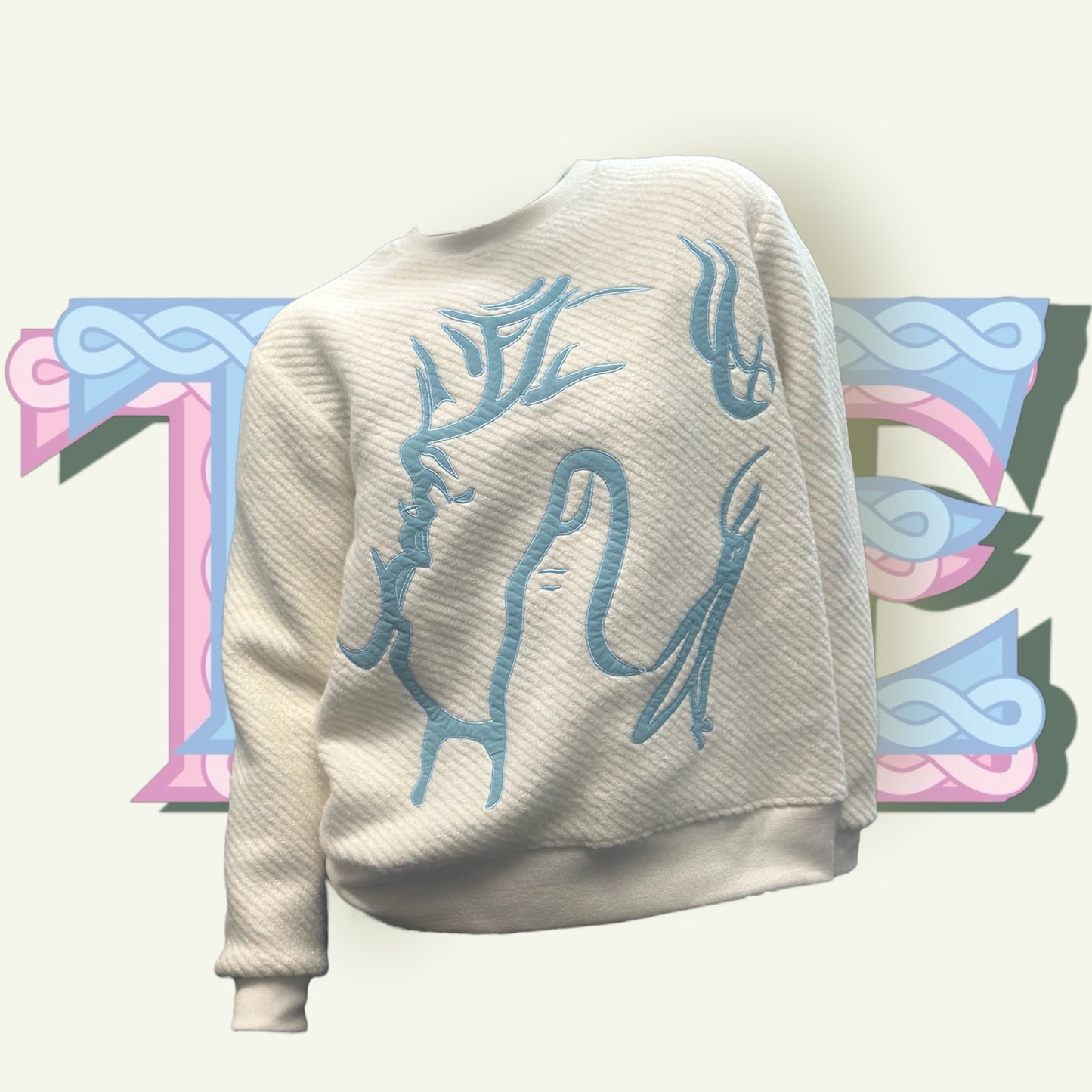 2.Embrace sweater