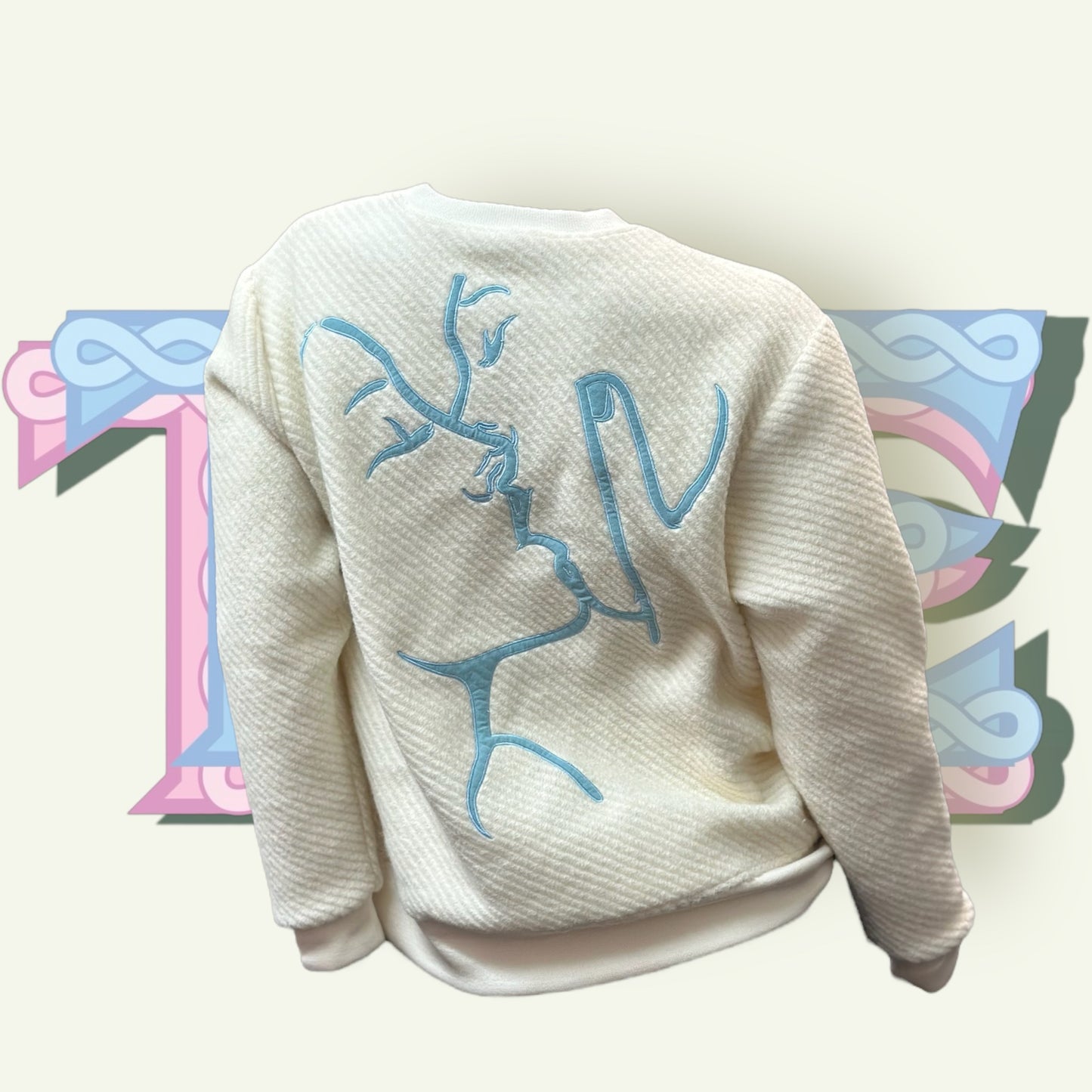 2.Embrace sweater